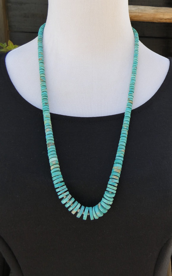 Long 27 inch turquoise bead necklace made by Ava Coriz, Santo Domingo USA. It is authentic turquoise vintage, 1980's.
