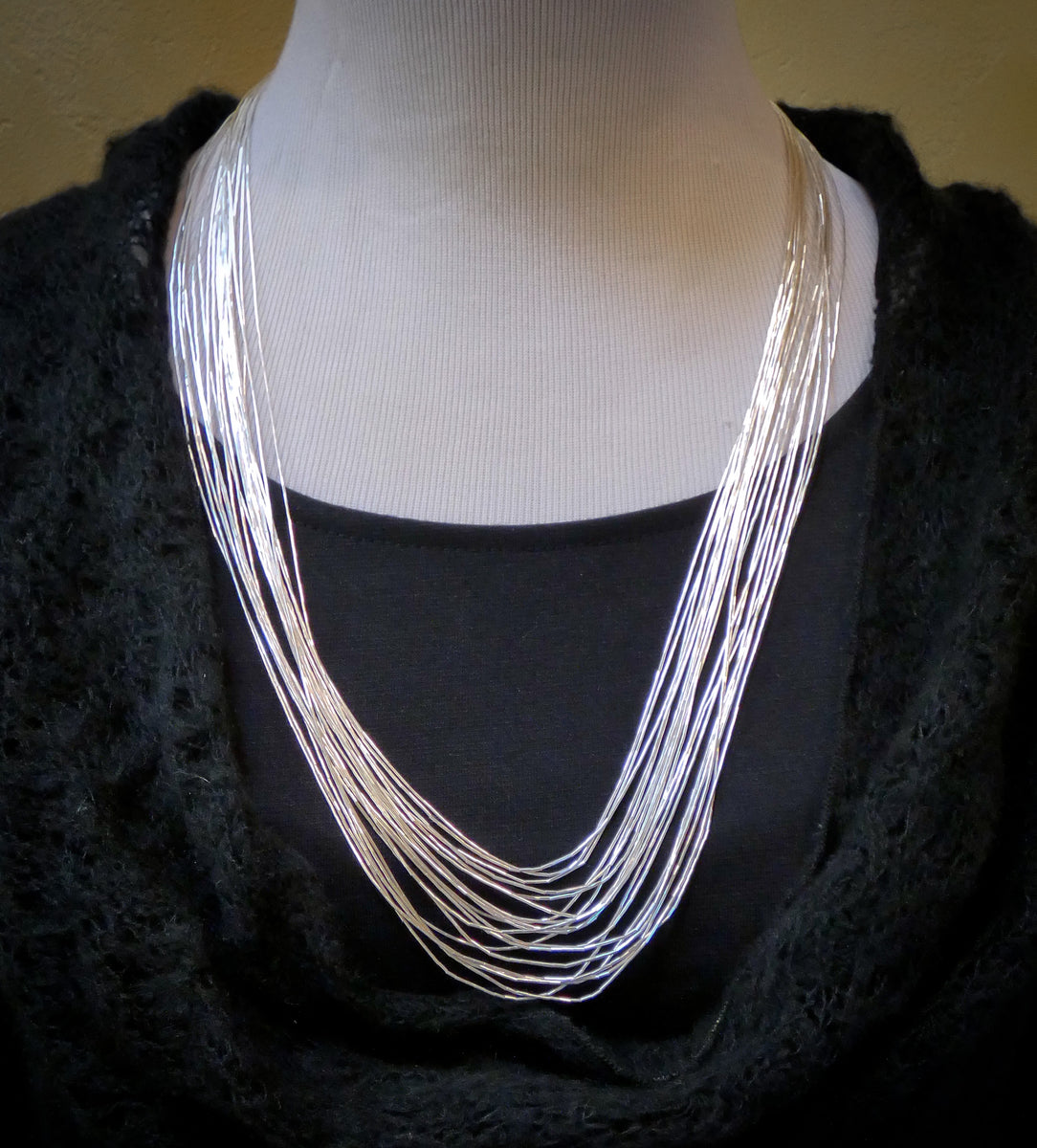 Liquid Silver Necklace top with Silver and Black Pendant +