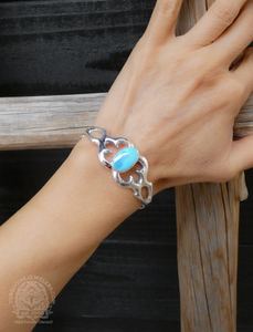 Small Wrist Navajo Sandcast Sterling Silver Golden Hill Turquoise Bracelet